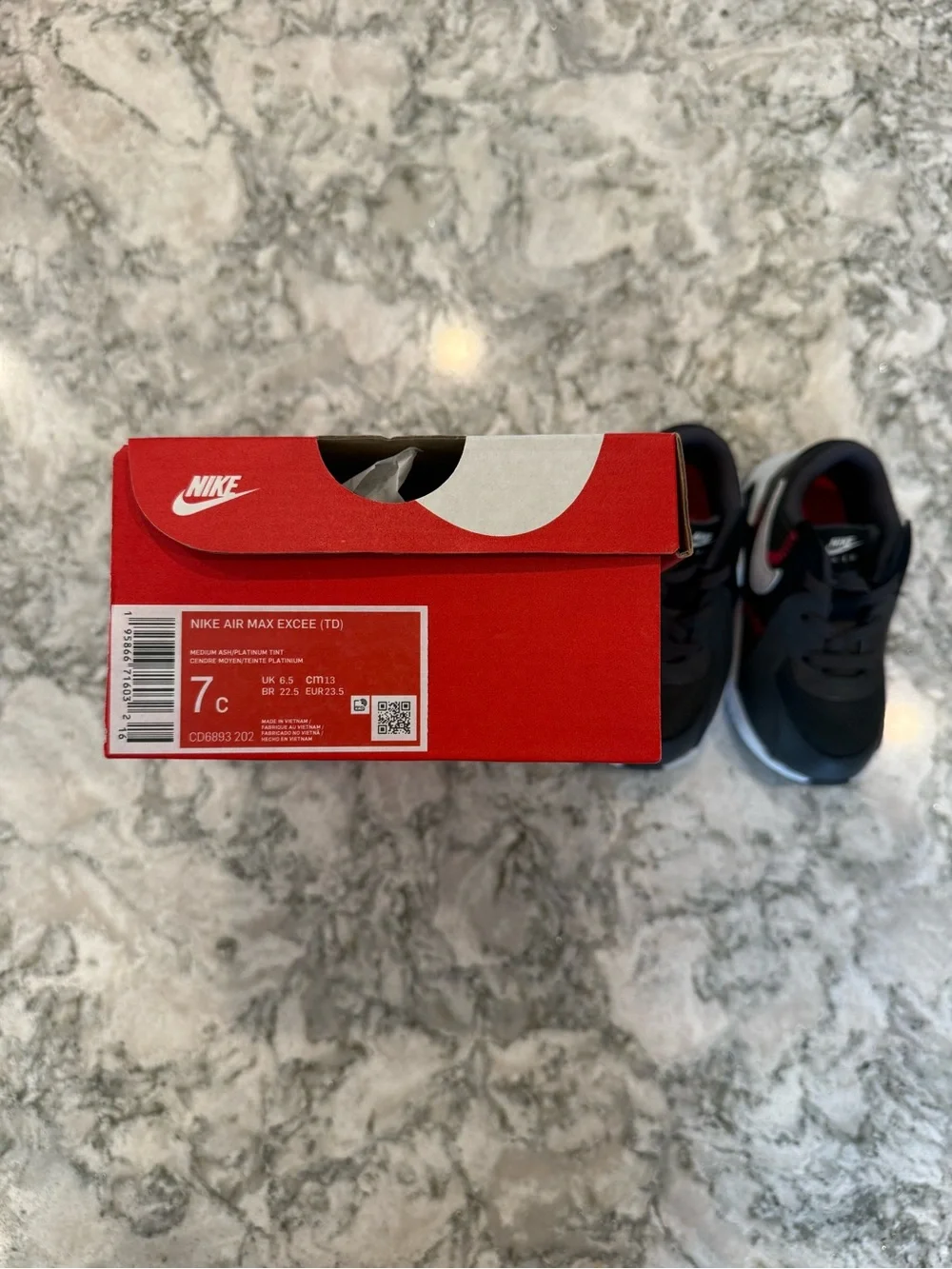Nike Kids Black/White Sneakers with Red Stitch Accents